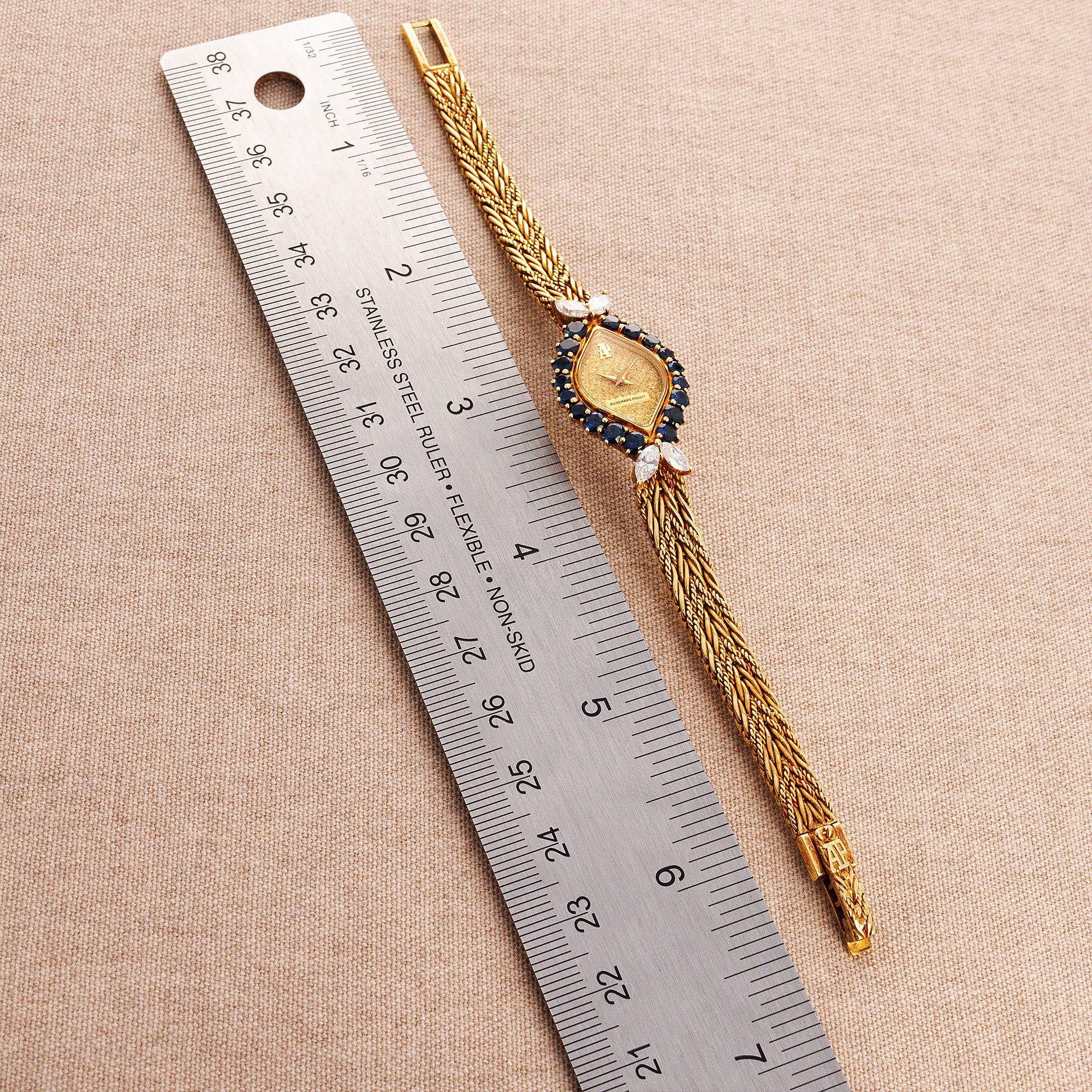 Audemars Piguet Yellow Gold Ladies Diamond and Sapphire Bracelet Watch - Image 8