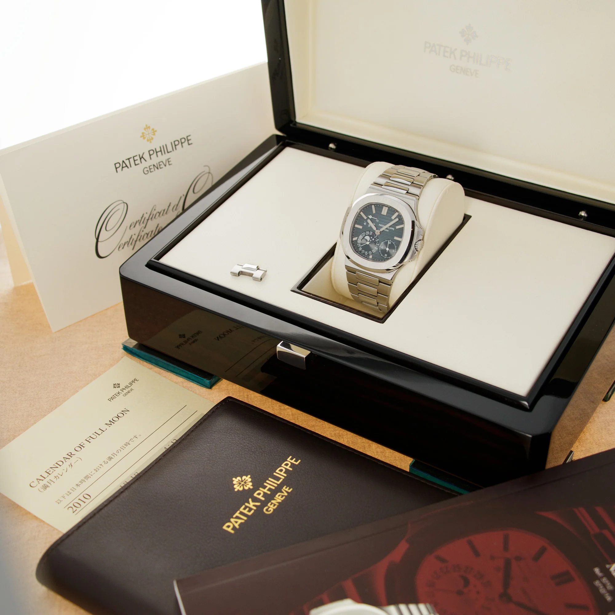 Patek Philippe Nautilus Moonphase Watch Ref. 5712 with Original Box and Papers - Image 9