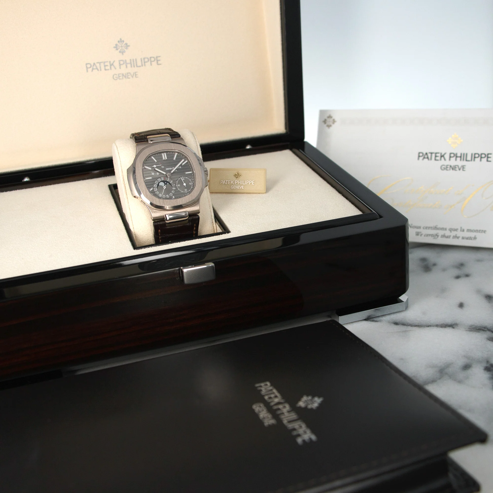 Patek Philippe White Gold Nautilus Moonphase Watch Ref. 5712 - Image 6