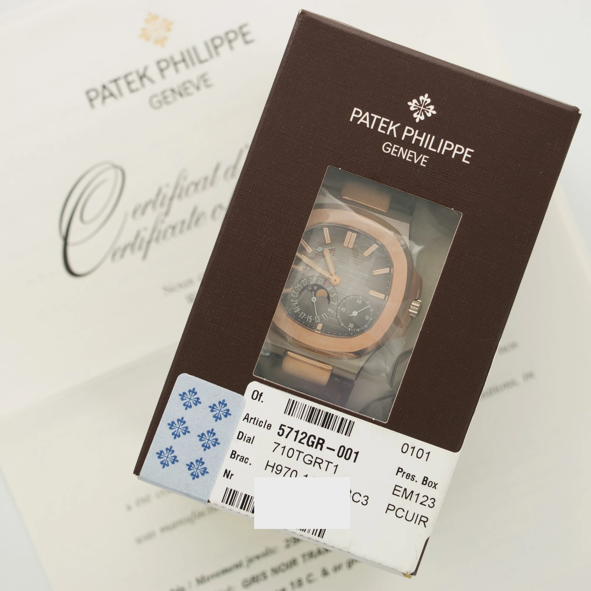 Patek Philippe White & Rose Gold Nautilus Moonphase Watch Ref. 5712 - Image 2