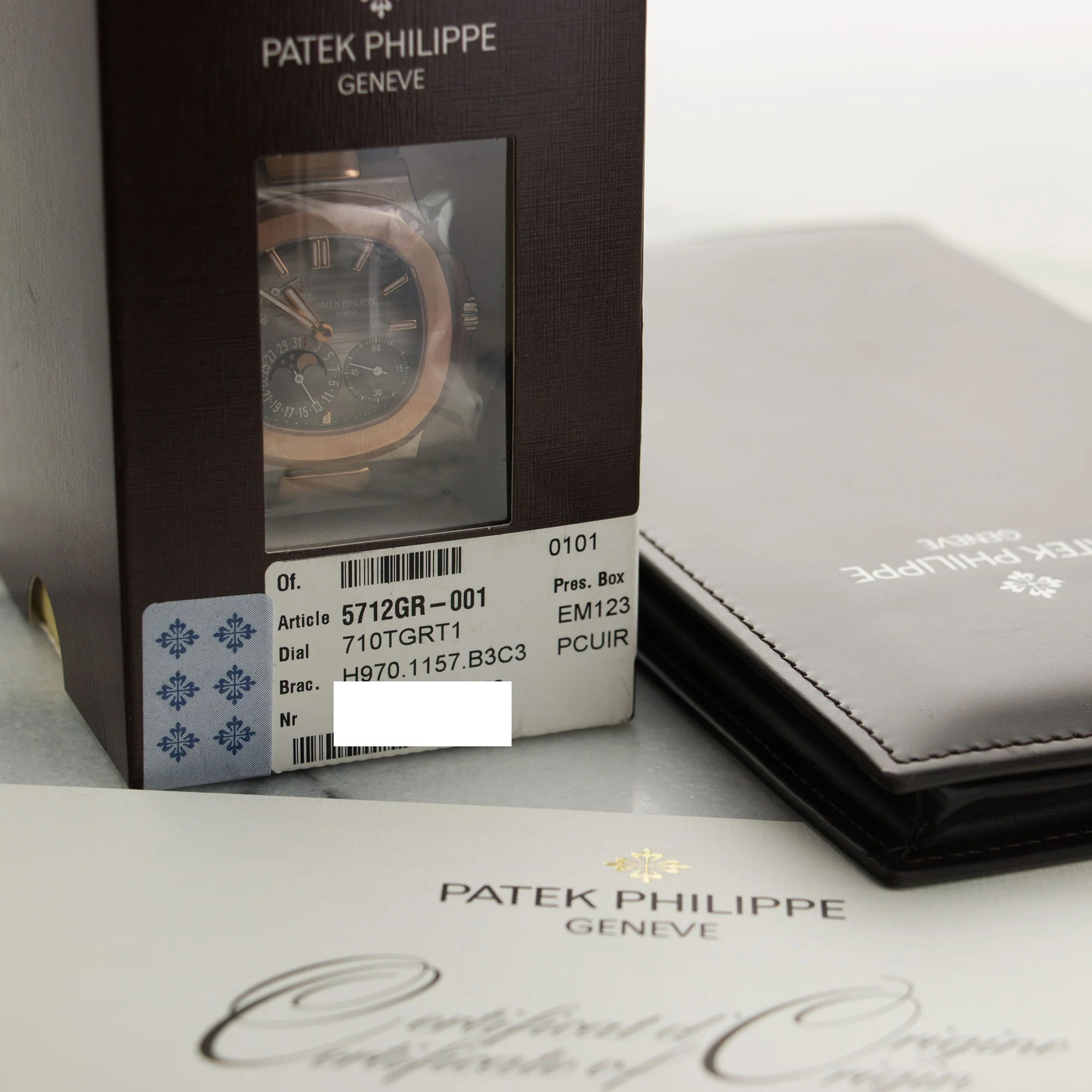 Patek Philippe White & Rose Gold Nautilus Moonphase Watch Ref. 5712 - Image 4